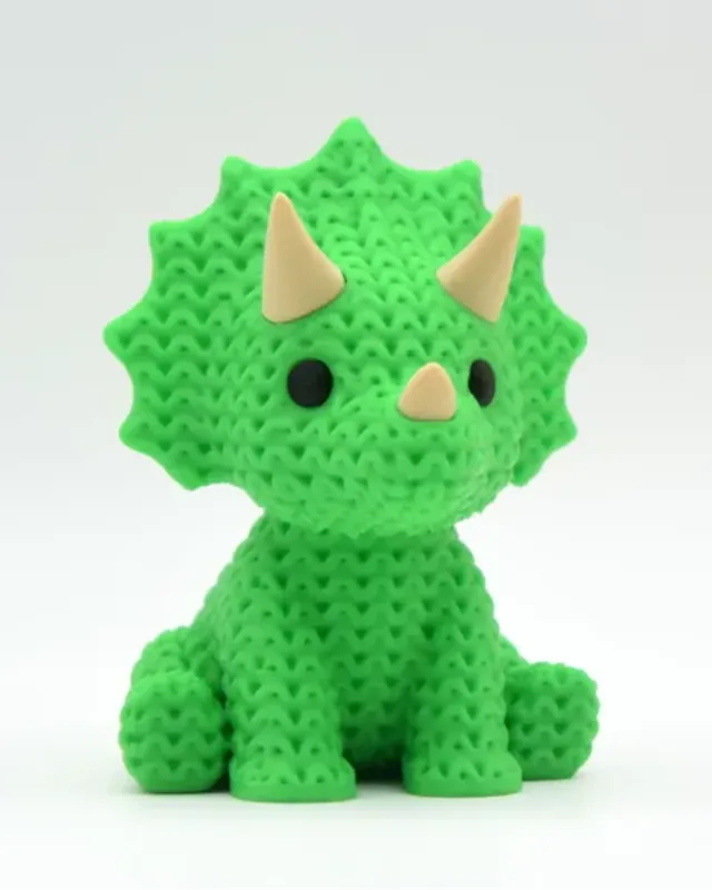 Dinosaure tricératops imprimé en 3D à la texture tricot